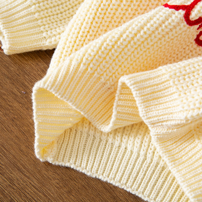 JoyKnit – Gemütlich & warm – Weihnachtspullover mit Aufdruck