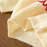 JoyKnit – Hyggelig og varm - Juletrøje med tekst